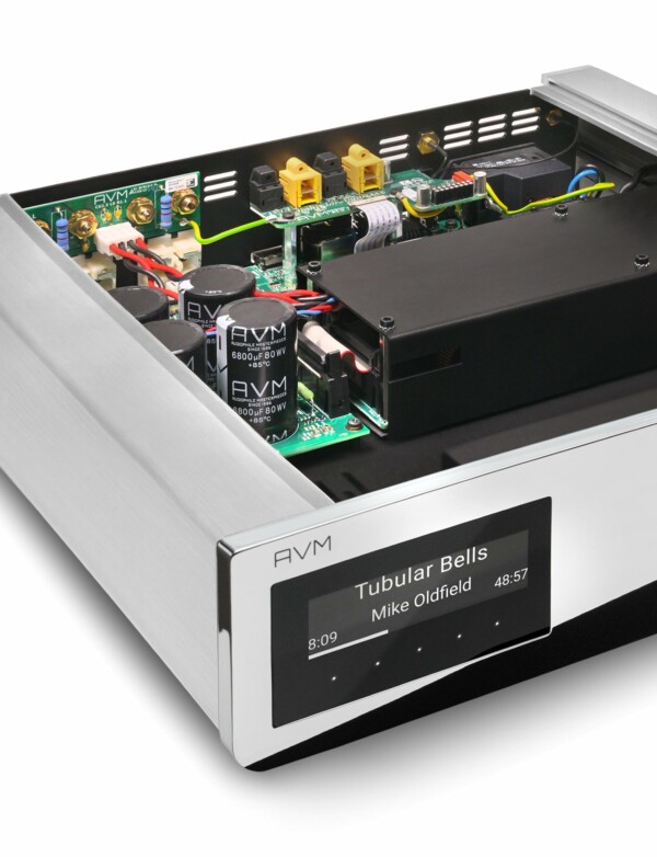 A silver-plated AVM - AS 2.3 - Streaming Integrated Amplifier with electronic components inside.