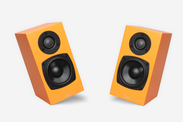 Two Totem Kin One orange rectangular bookshelf speakers with black round speaker cones, positioned facing each other on a white background.