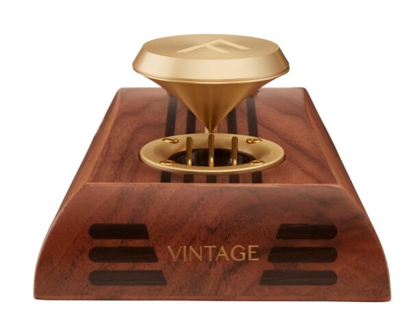 A wooden desktop speaker with gold accents, featuring the word "Vintage" engraved on the front and a gold, cone-shaped speaker on top.