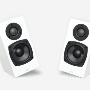 A pair of Totem Kin One bookshelf speakers, compact and white with circular black drivers, stands angled facing each other against a pristine white background.